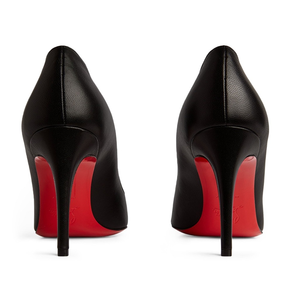 Sophisticated Black Heels with Striking Red Soles.